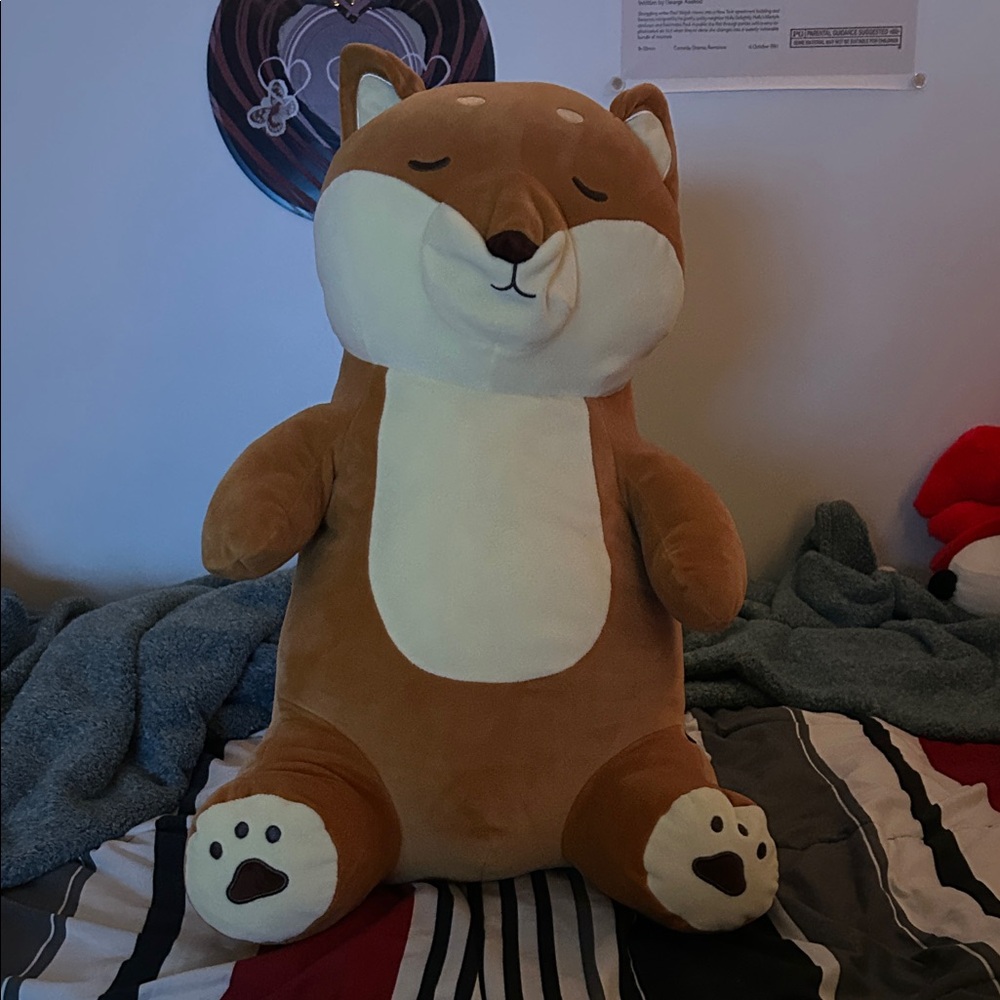 Brown and Cream Stuffed Animal Toy